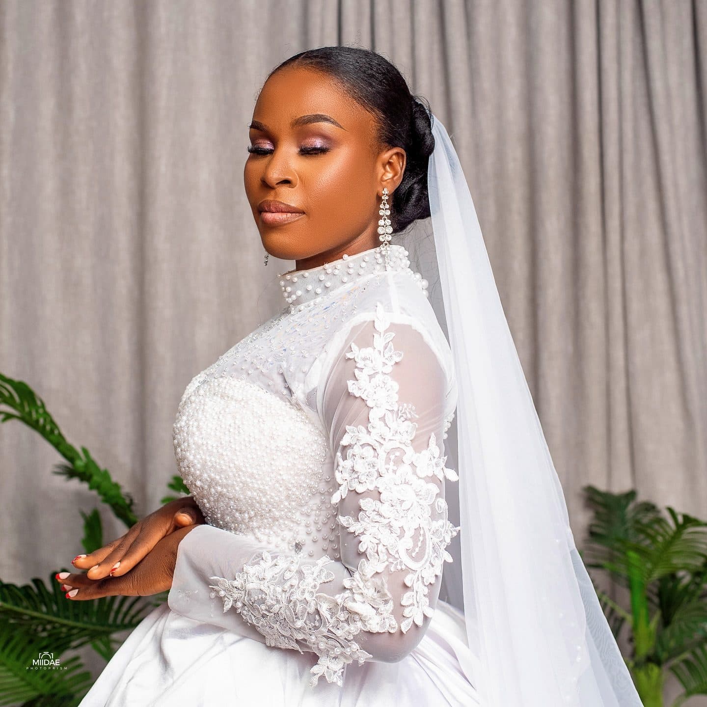 Portrait of a student's beaded white ball gown