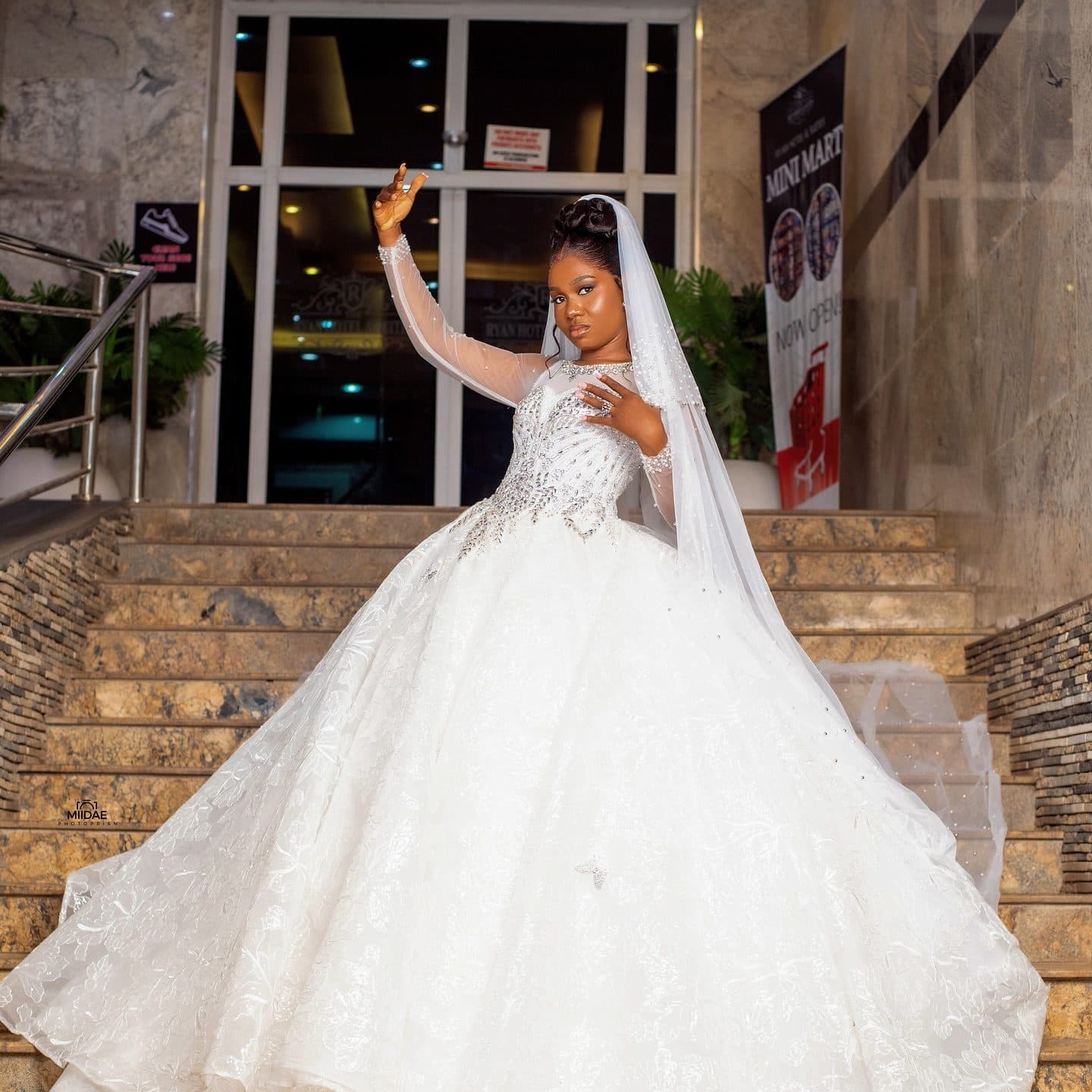 A student's ball gown worn with a long veil