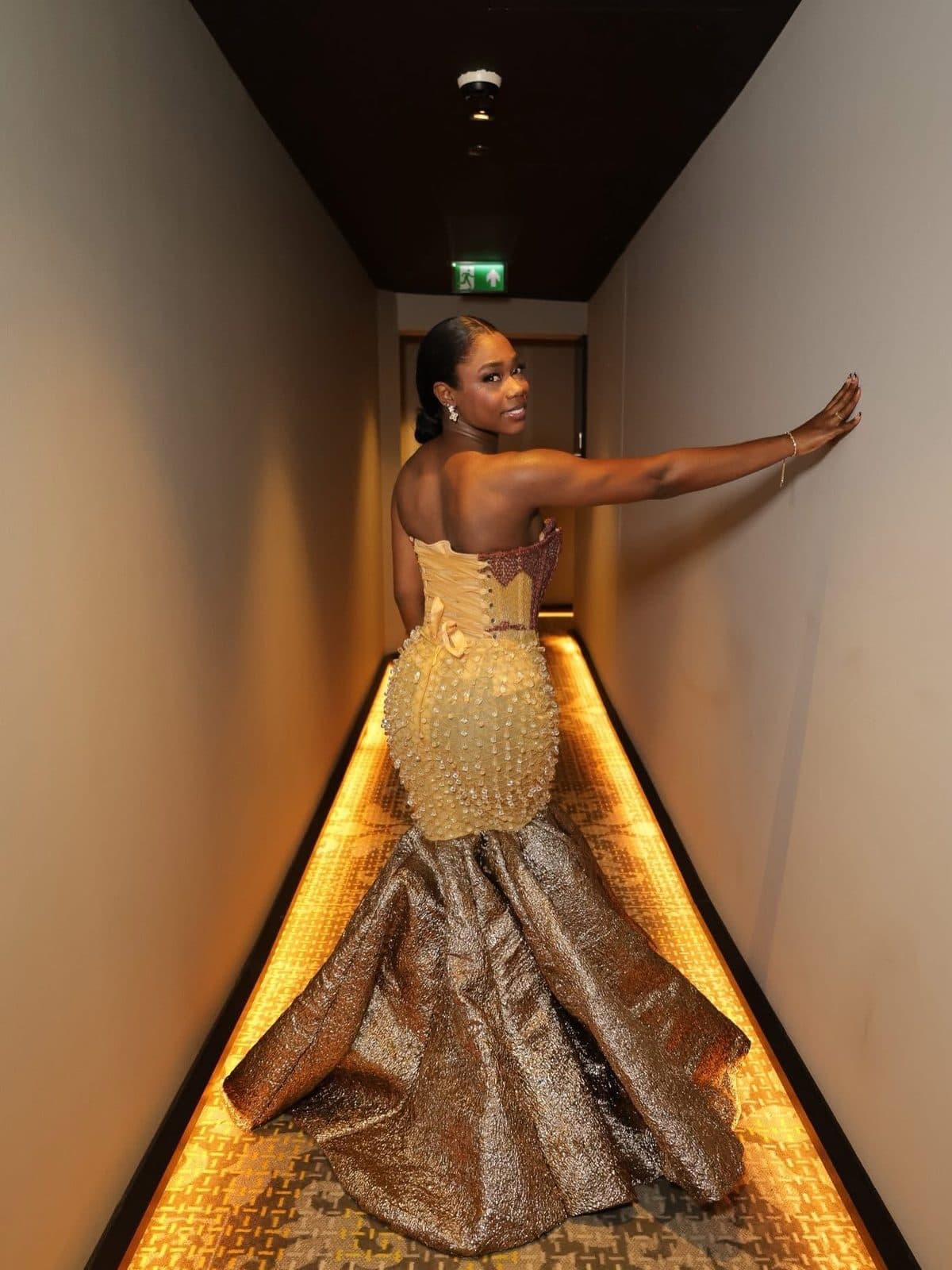The gold gown photographed from the side
