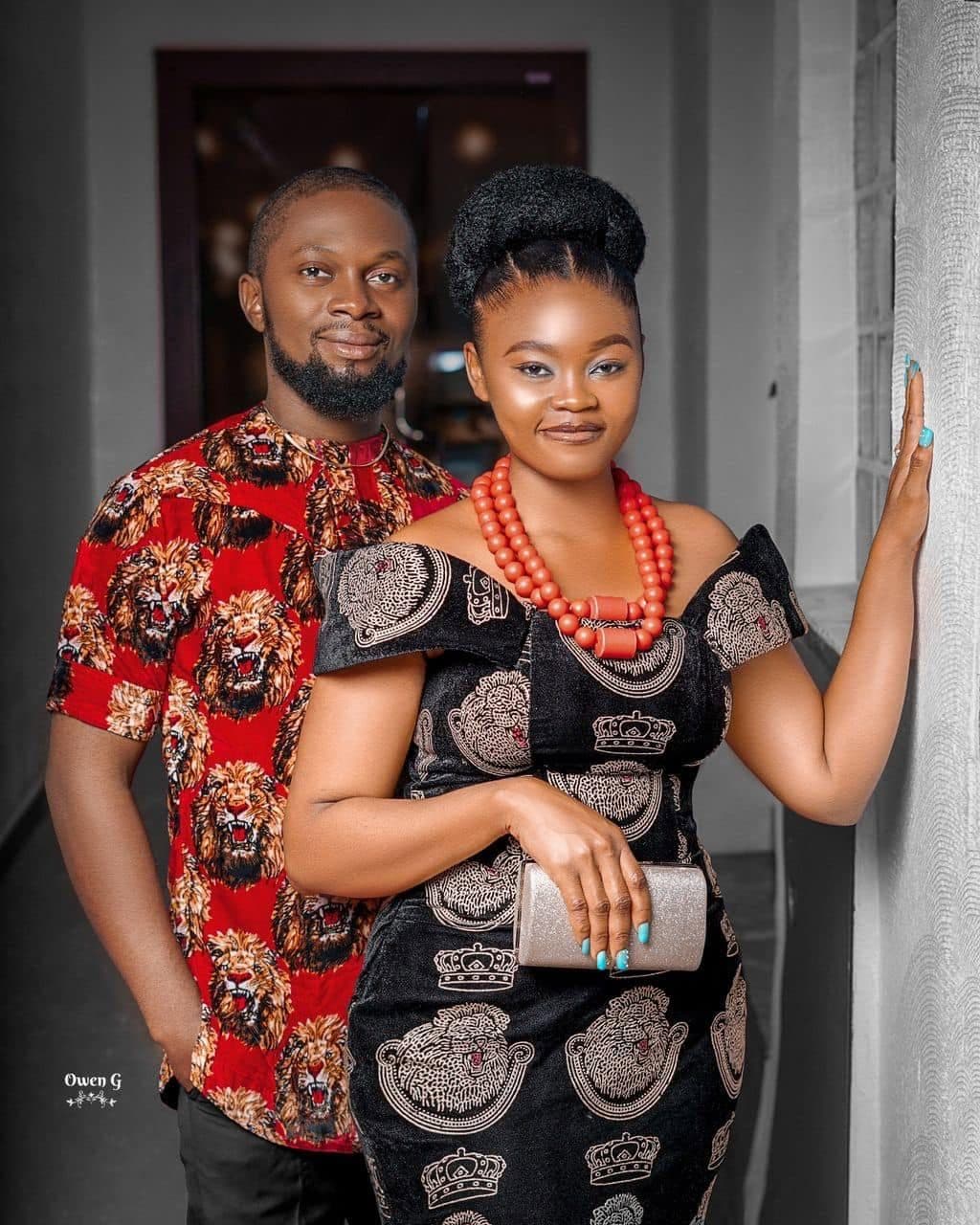 The couple smiling together on their traditional wedding day