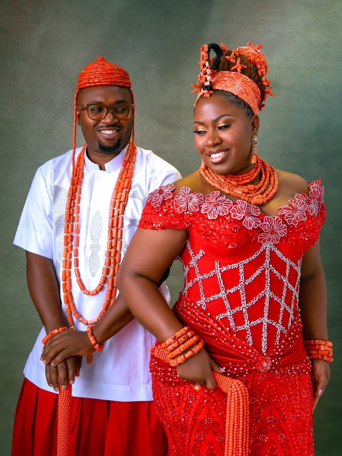 The bride and groom in their traditional attire
