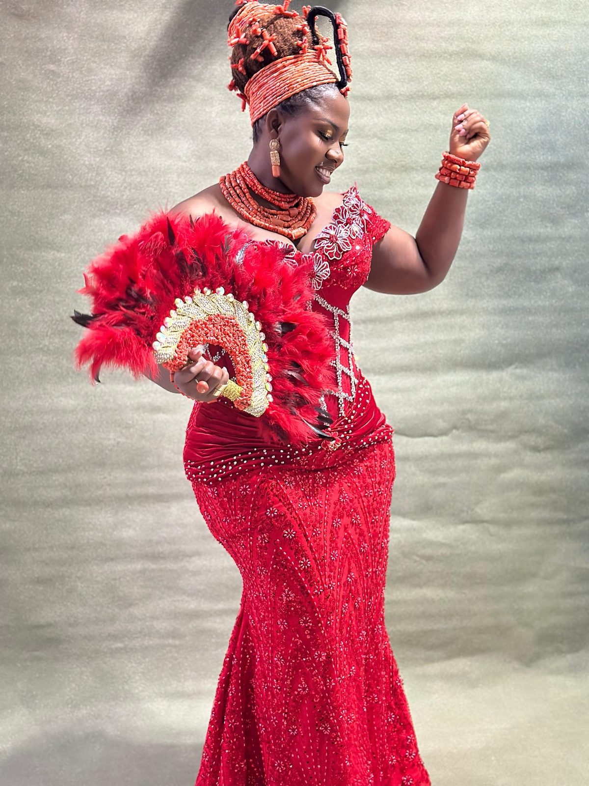 The red beaded traditional look made from measurements taken on a video call